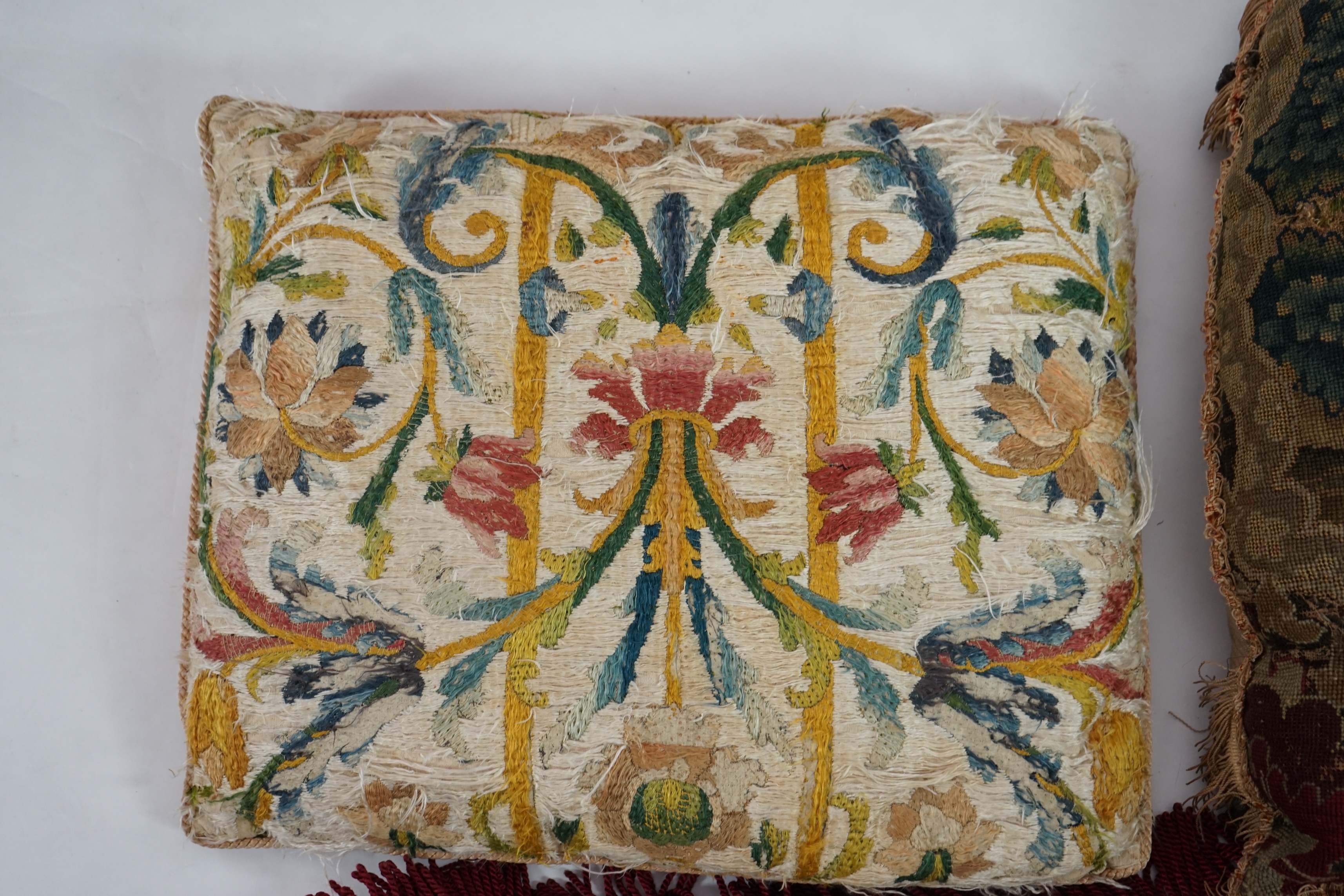 Four various fragments from the 18th and 19th century made into cushions